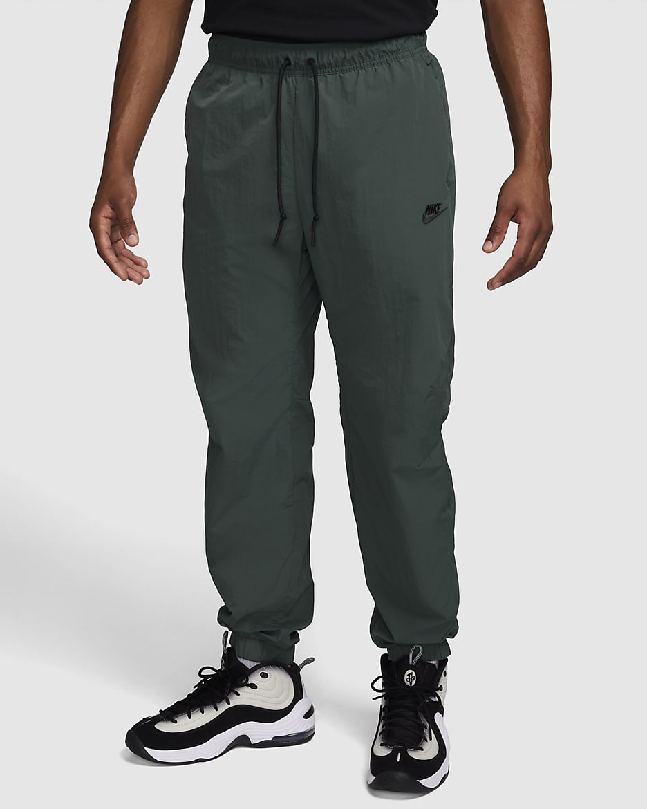 Nike Tech Men s Woven Taper Leg Pants